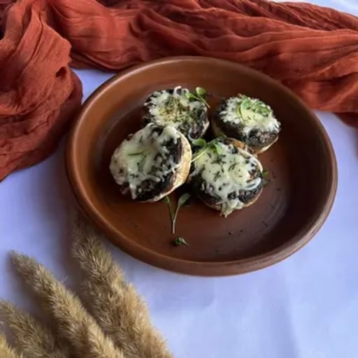 Шампиньоны, фаршированные моцареллой